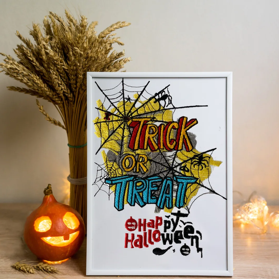 Trick Treat Text Halloween Poster Embroidery design with spider net background